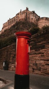Red Post Box with Edinburgh Castle behind